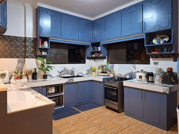 Serene Charm Elegant Blue Bungalow on a Spacious Lot