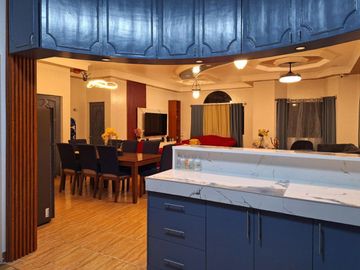 Serene Charm Elegant Blue Bungalow on a Spacious Lot
