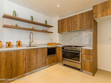 Departamento en venta en La Cruz de Huanacaxtle a solo 150m de la playa.