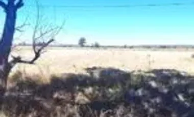 Rancho en venta a pie de carretera a la entrada de Pueblo Nuevo.