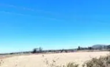 Rancho en venta a pie de carretera a la entrada de Pueblo Nuevo.