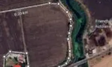 Rancho en venta a pie de carretera a la entrada de Pueblo Nuevo.