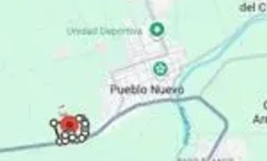 Rancho en venta a pie de carretera a la entrada de Pueblo Nuevo.