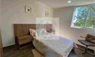 VENTA DE CASAS FRACC LAS LUNAS 3 CUAUTLANCINGO SALÓN DE USOS MÚLTIPLES  ÁREAS VERDES JUEGOS INFANTILES ROOF GARDEN CON PÉRGOLA  CERCA DE PUERTA 3 de VW