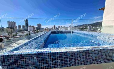 Departamento en renta en Fraccionamiento Costa azul  cerca de playa, primer nivel, con elevador, alberca y palapa en roof garden