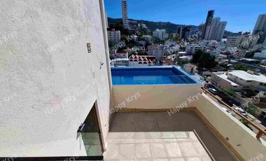Departamento en renta en Fraccionamiento Costa azul  cerca de playa, primer nivel, con elevador, alberca y palapa en roof garden