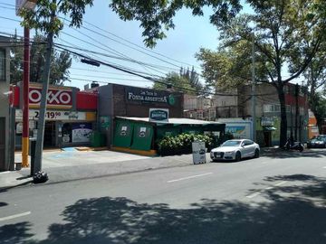 Terreno con locales rentados