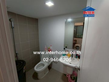 Two-story townhome, 24.3 sq.wa., Pruksa 115 Village, Soi Khlong 1/2, Rangsit-Nakhon Nayok Road, Yothathikan Road, Khlong Luang, Pathum Thani.