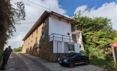 PREDIO CON HOTEL, UNA CABAÑA Y UNA GALERA EN TLANCHINOL, HIDALGO. REMATE ADJUDICADO