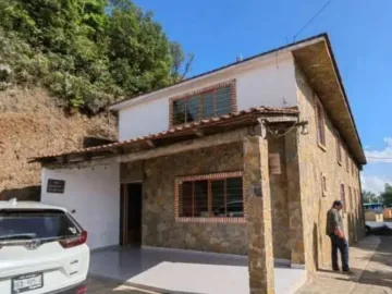 PREDIO CON HOTEL, UNA CABAÑA Y UNA GALERA EN TLANCHINOL, HIDALGO. REMATE ADJUDICADO