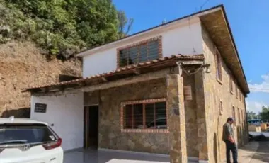 PREDIO CON HOTEL, UNA CABAÑA Y UNA GALERA EN TLANCHINOL, HIDALGO. REMATE ADJUDICADO