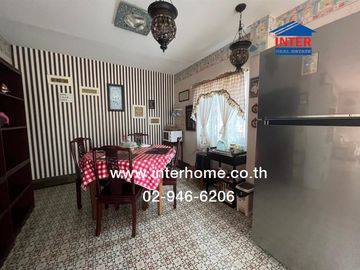 Land + 2 houses, 599 sq.w. (approx. 2,996 sq.m.) Muang Ek Village, near Rangsit University, Soi Ek Thaksina 4, Phahonyothin Road, Kamphaeng Phet 6 Roa