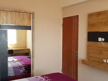 Apartemen Puncak Dharmahusada, Strategis, Full Furnish