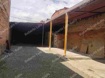 Vendo lote de terreno con permiso de bodega en santa cruz
