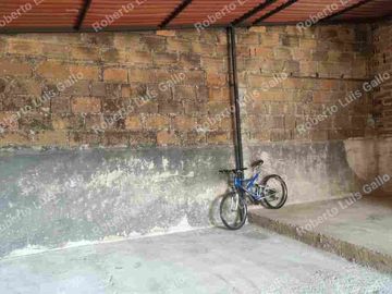 Vendo lote de terreno con permiso de bodega en santa cruz