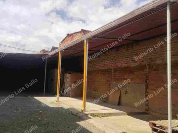 Vendo lote de terreno con permiso de bodega en santa cruz