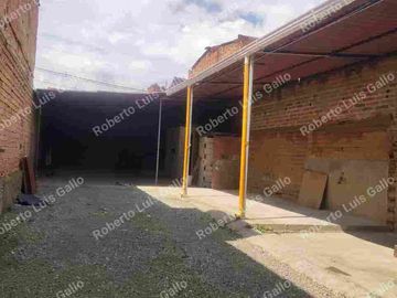 Vendo lote de terreno con permiso de bodega en santa cruz