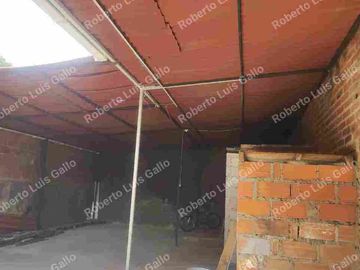 Vendo lote de terreno con permiso de bodega en santa cruz