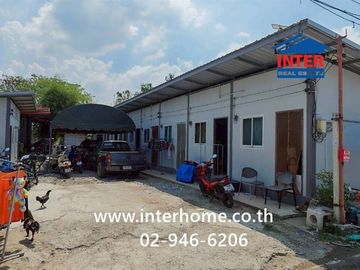 Single-story house + factory + workers' accommodation on a 286 sq.wah (approximately 1,114 sq.m) plot of land. Located near Khlong Sra School, Soi Wat