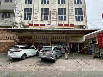 Ruko Gandeng 4 Jalan Rahmadsyah Usaha Alfamart Dan RedDoorz