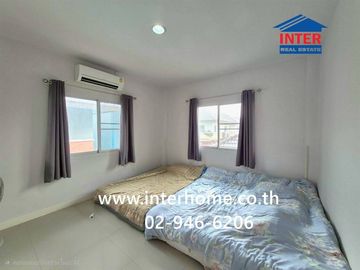 Two-story detached house, 60 sq.wa., Panyasiri Village, near Ladlumkaew Hospital, Soi Tesaban 7, Ladlumkaew, Pathum Thani.