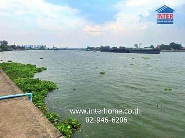 A 3 rai, 263.9 sq.wa (approximately 1.2 acres) vacant land plot located on the Chao Phraya River in Pathum Thani City, near Wat Thian Thawai and on Ba