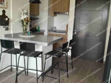 Arriendo departamento amoblado con estacionamiento en la Reina