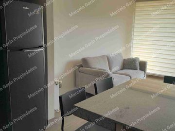 Arriendo departamento amoblado con estacionamiento en la Reina