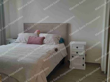 Arriendo departamento amoblado con estacionamiento en la Reina