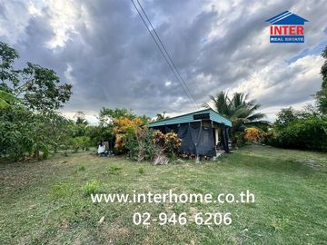 Land + 1-story house with garden, 400 sq.wa. (approx. 1600 sq.m.), near PTT gas station, Nong Pherangai, Nonthaburi, on Sai Noi-Wat Ton Chuek Road, al