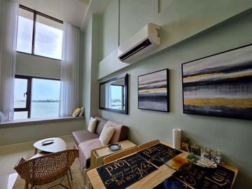 For Rent: Brand New Unit Fully Furnished 1 Bedroom Loft at Mandani Bay Suites Tower 2 by HTLand, Inc., Mandaue - 47sqm.