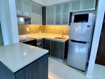 Arya Residences T1 | 1BR with Balcony | 67 sqm | With Parking | ₱80K