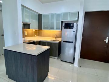 Arya Residences T1 | 1BR with Balcony | 67 sqm | With Parking | ₱80K