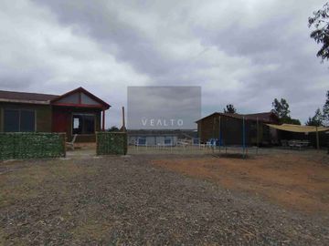Parcela con 2 cabañas equipadas en Algarrobo Norte