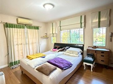 Two-story detached house, 64.5 sq.w., Chonlada Suvarnabhumi Village. Krungsri Ayutthaya Bank is located at the entrance of the soi (lane), Soi Ladkrab