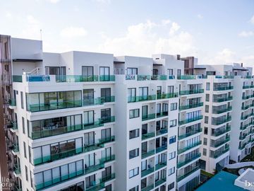 Departamento de Lujo de 2 Recámaras en Venta | Alta Plusvalía en Nuevo Centro Urbano, Playa del Carmen.
