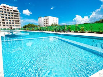 Departamento de Lujo de 2 Recámaras en Venta | Alta Plusvalía en Nuevo Centro Urbano, Playa del Carmen.