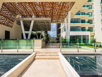 Departamento de Lujo de 2 Recámaras en Venta | Alta Plusvalía en Nuevo Centro Urbano, Playa del Carmen.