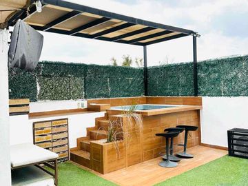 Casa con Roof garden asador y jacuzzi