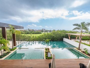 Departamento en Puerto Cancún, golf, club de playa, alberca común, en venta