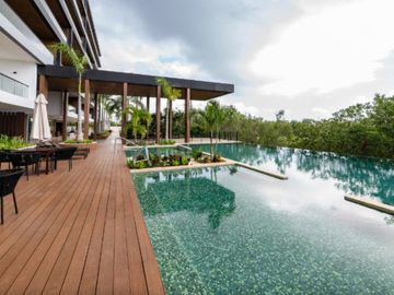 Departamento en Puerto Cancún, golf, club de playa, alberca común, en venta
