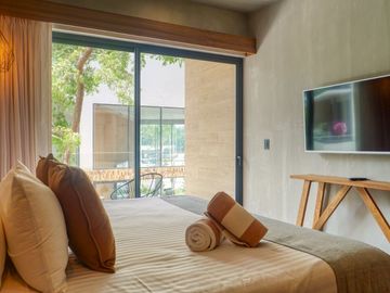 Estudio amueblado con historial de rentas vacacionales, spa, rooftop con alberca infinity, Art walk, cine al aire libre, en avenida Cobá, Tulum en ven