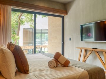 Estudio amueblado con historial de rentas vacacionales, spa, rooftop con alberca infinity, Art walk, cine al aire libre, en avenida Cobá, Tulum en ven