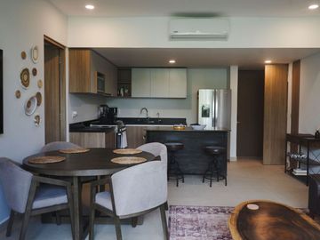 Condo amueblado, vista al campo de golf, venta, Tulum Country Club