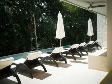 Condo amueblado, vista al campo de golf, venta, Tulum Country Club