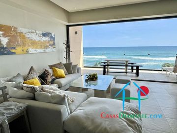 Departamento a pie de playa con terraza y vista frontal al mar