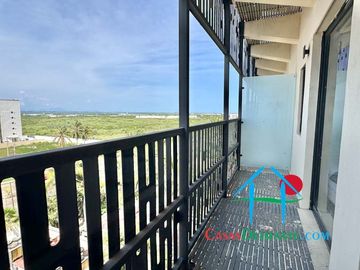 Departamento a pie de playa con terraza y vista frontal al mar