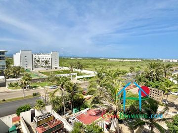 Departamento a pie de playa con terraza y vista frontal al mar