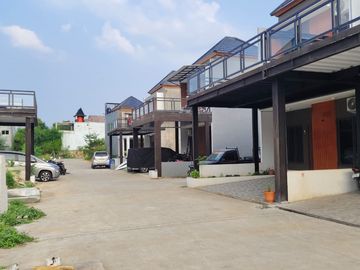 Rumah cluster premium pinggir jalan raya jatiwarna harga cuma 900juta an