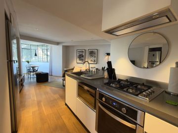 Departamento amueblado con rooftop, área lounge, lobby, en venta